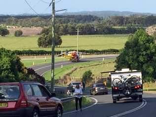 The Westpac Rescue Helicopter landed on Ross Lane near Lennox Head to transport a motorcyclist injured in a crash. Picture: Marc Stapelberg