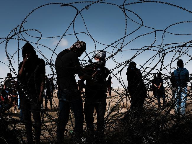 What would you do if tens of thousands of Gazans mustered along your border, threatening to tear down the fence? Picture: Getty Images