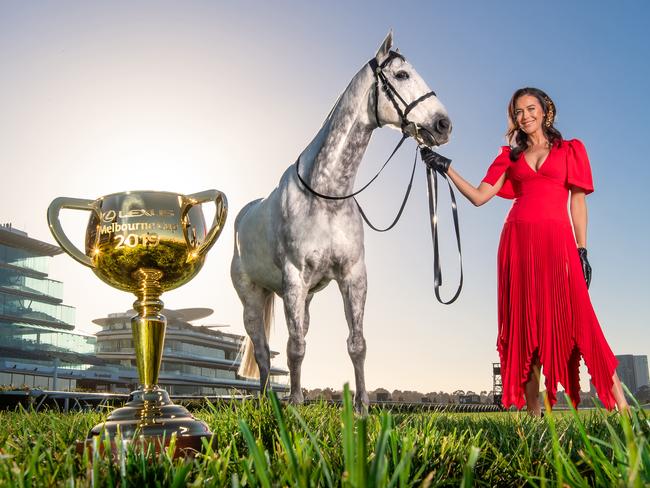 Megan Gale with the 2019 Melbourne Cup and horse, Gunner, at Flemington. Picture: Jason Edwards