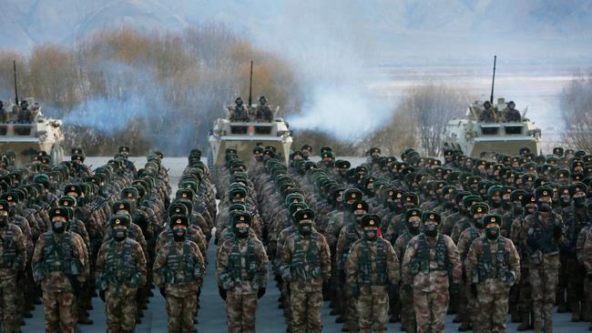 Chinese People's Liberation Army (PLA) soldiers assemble during military training at Pamir Mountains in Kashgar, northwestern China's Xinjiang region. Picture: AFP.