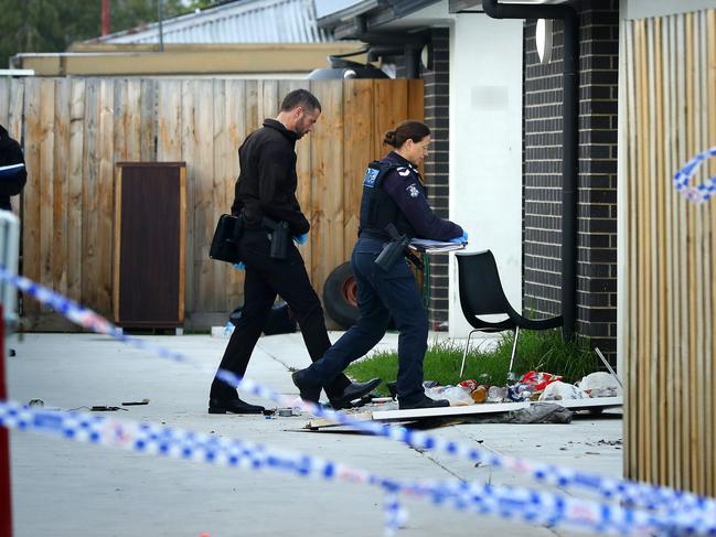 Investigators at a unit in Karrin Court Norlane where police negotiated with a man for several hours before specialist officers forced their way inside and arrested him. Picture: Alison Wynd