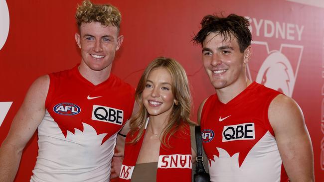 Chad Warner and Errol Gulden with American actress Sydney Sweeney during the Round 2 AFL match between the Sydney Swans and Hawthorn Hawks at the SCG on March 26, 2023. Picture: Phil Hillyard.
