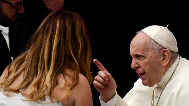 Pope Francis speaks to newlyweds during the weekly general general audience at the Vatican on Wednesday. Picture: AFP