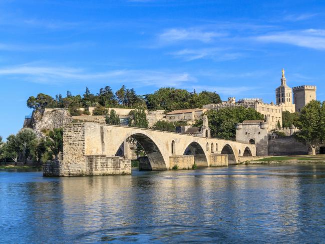 Avignon Bridge with Popes Palace on the Rhone, France.