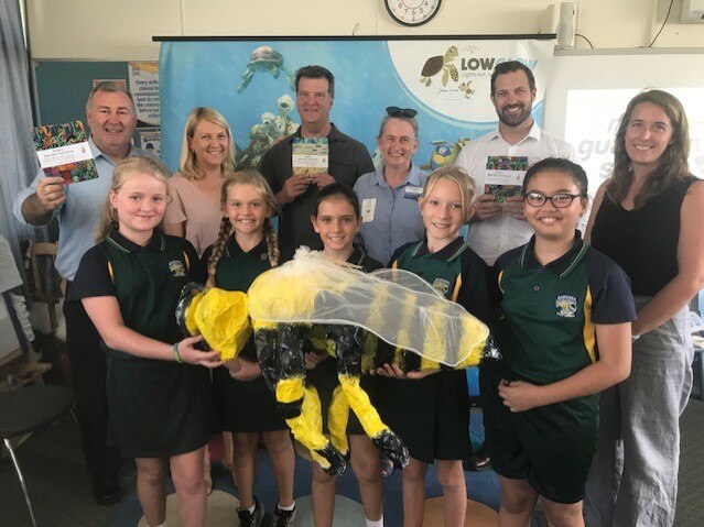 Bargara State School students and staff with Mayor Jack Dempsey, GBRMPA CEO Josh Thomas and chief scientist Dr David Wachenfeld.