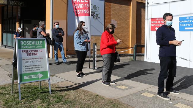 People queue for Covid testing or a vaccine in Roseville, Sydney. Picture: Gaye Gerard