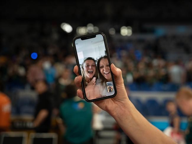 Scott Roth's daughter Dene and wife Lorie joined him on the court after the game — on FaceTime. Picture: Twitter/JackJumpers