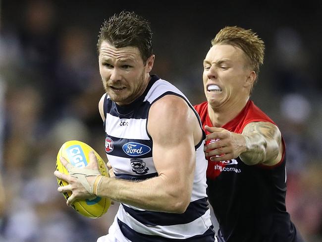 MELBOURNE, AUSTRALIA - APRIL 08:  Patrick Dangerfield of the Cats runs with the ball during the round three AFL match between the Geelong Cats and the Melbourne Demons at Etihad Stadium on April 8, 2017 in Melbourne, Australia.  (Photo by Scott Barbour/Getty Images)