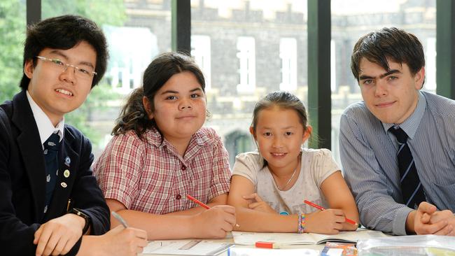 Chris, 17, Grace, 10, Tina, 10, and Hamish, 16, at Melbourne Grammar School. Picture: Josie Hayden