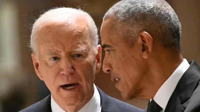 TOPSHOT - US President Joe Biden (L) speaks with former US President Barack Obama during the memorial service for Ethel Kennedy, the wife of the late senator Robert F. Kennedy, at the Cathedral of St. Matthew the Apostle in Washington, DC on October 16, 2024. (Photo by Mandel NGAN / AFP)