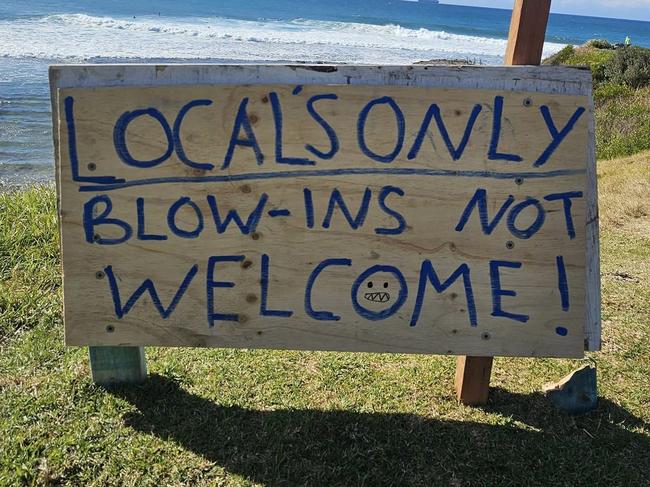 A painted sign appeared at Sandon beach on Sunday afternoon. Picture: Facebook