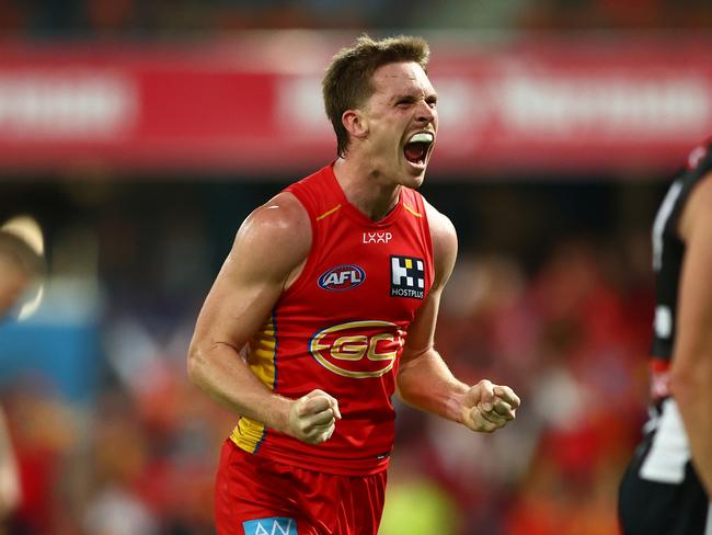 Noah Anderson of the Suns celebrates winning the round 16 AFL match between Gold Coast Suns and Collingwood Magpies. (Photo by Chris Hyde/Getty Images)