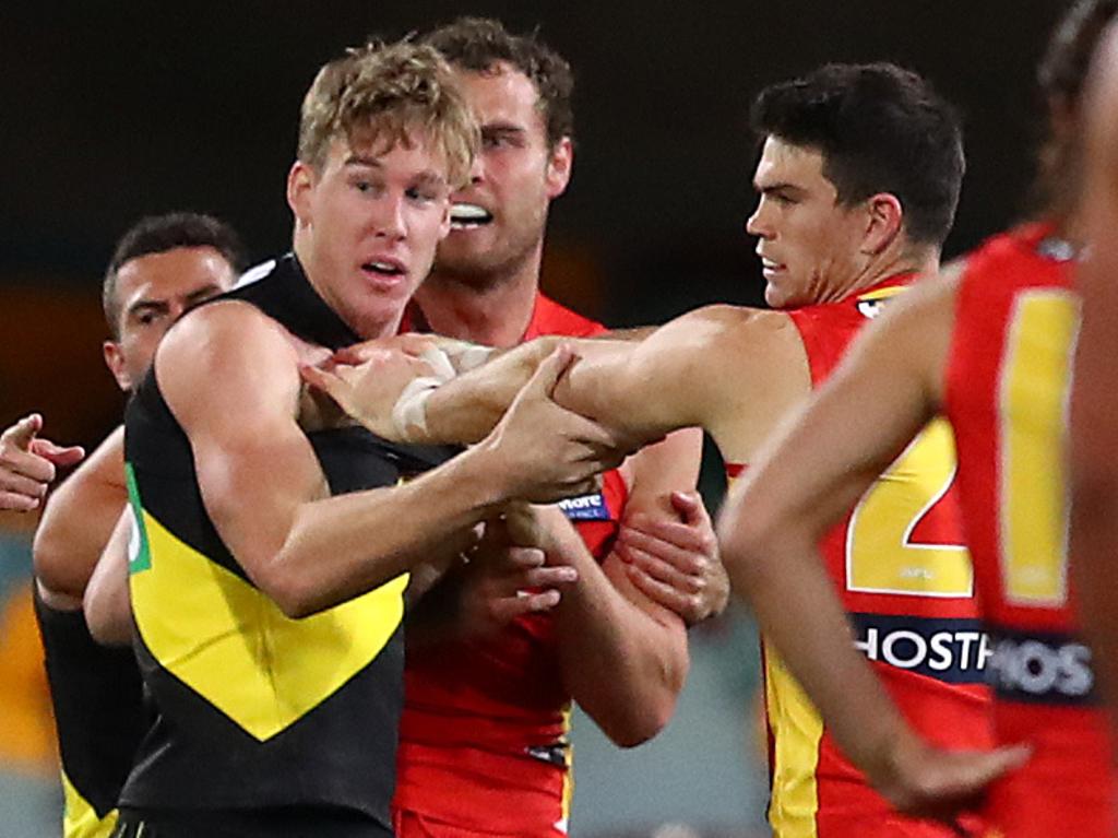 Tom Lynch scuffles with Sam Collins. (Photo by Jono Searle/AFL Photos/via Getty Images)