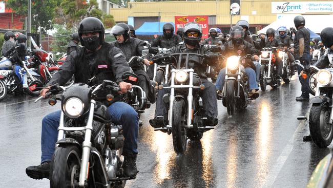 Members hide their identities during a Hells Angels bikie run.