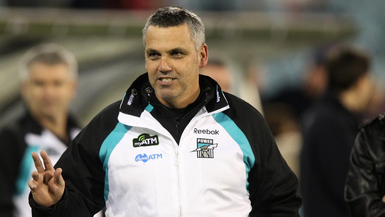 Port Adelaides' coach Mark Williams waves to fans during his last day as coach for Port Adelaide during round 15 AFL match between Port Adelaide and Collingwood at AAMI Stadium, Adelaide, Friday, July 9, 2010. (AAP Image/Ben McMahon) NO ARCHIVING, EDITORIAL USE ONLY