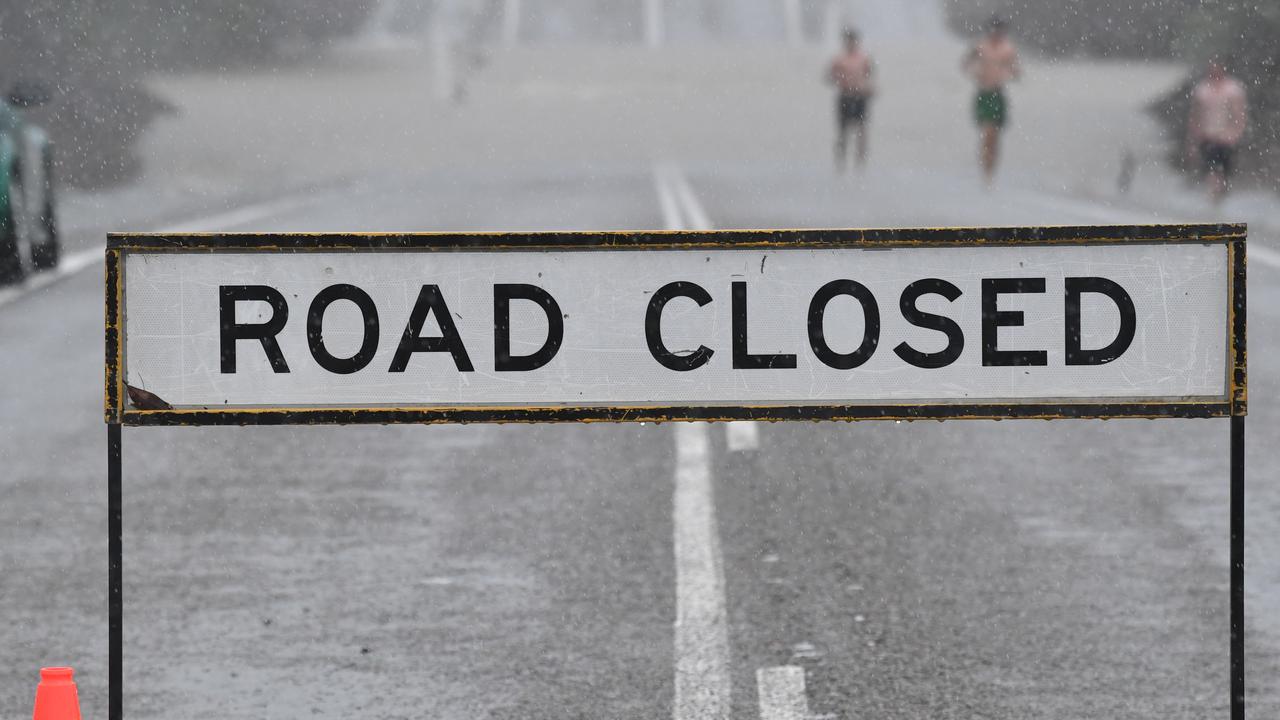 Police frustrated as motorists drive through flood waters