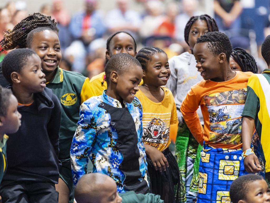 Ready to say hello in their language are students representing the Democratic Republic of the Congo during Harmony Day celebrations at Darling Heights State School. Picture: Kevin Farmer