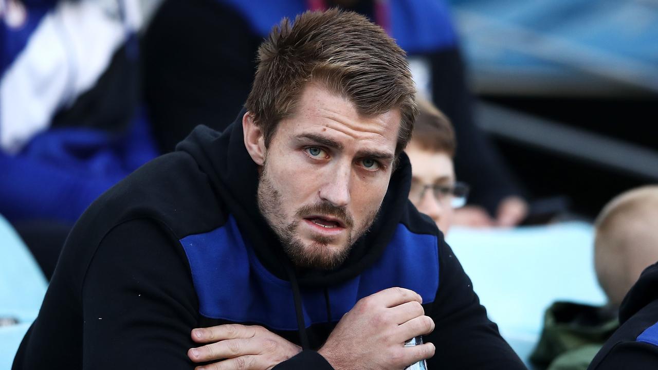 Injured Bulldogs player Kieran Foran watches on from the sidelines. (Photo by Mark Kolbe/Getty Images)