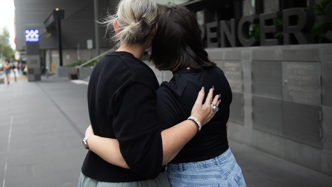 The mother with her daughter, who was the victim of the recent schoolgirl abduction in Hosier Lane, speak to the media at Police HQ, Melbourne. Picture: NCA Newswire / Nicki Connolly