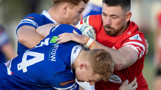 Narellan’s Dylan Ross gets in front of the Goannas. Pics by Julian Andrews.