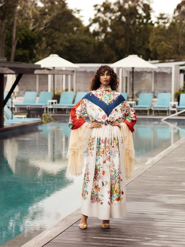 Gucci bell-sleeve silk lace blouse and floral print drawstring silk gown; Christian Louboutin tape measure-detail perspex heels.