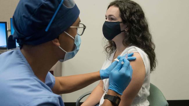 A volunteer is given the Moderna COVID vaccine. Picture: AFP