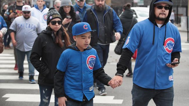 Fans arrive at Wrigley Field for the Chicago Cubs. (Scott Olson/Getty Images/AFP)