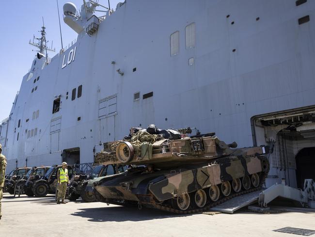 Australian Army soldiers from the 3rd Brigade disembark from HMAS Adelaide during the conclusion of exercise Indo Pacific Endevour at the Townsville Port, Townsville, QLD. PHOTO: TPR Dana Millington