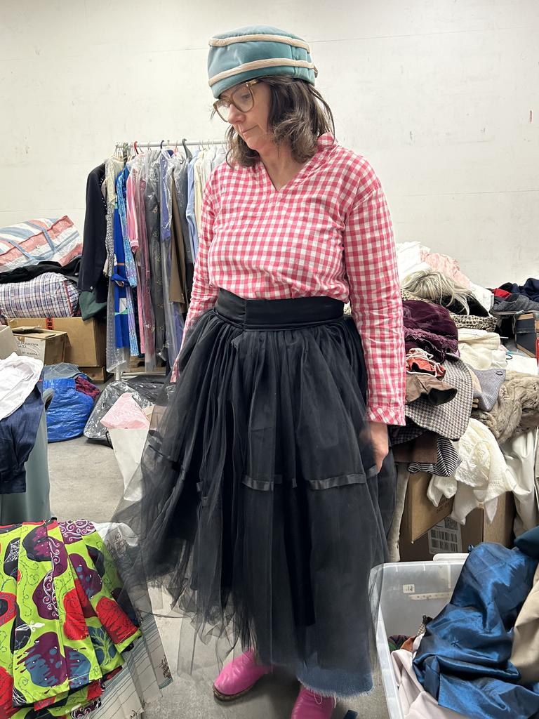 Amanda Blair models some op-shop ensembles.