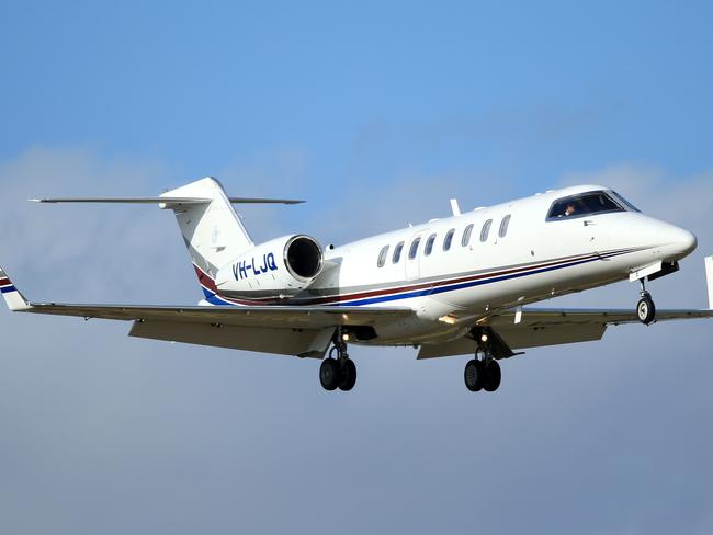 The jet carrying the White Island volcano victims arriving at Essendon Airport, Melbourne. Picture: Mark Stewart