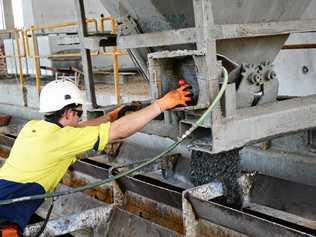 A worker pours concrete in to a pile mould. Picture: Allan Reinikka ROK070217astressc