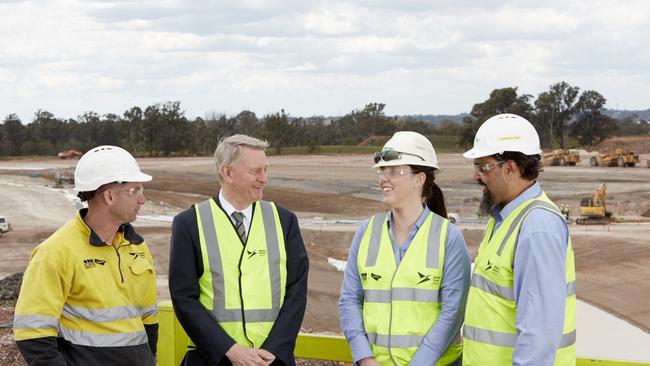 Western Sydney Airport Chief Executive Graham Millett (second from left) with workers Carl Marino, Elloise McWilliams and Travis Fell. Picture: Supplied.