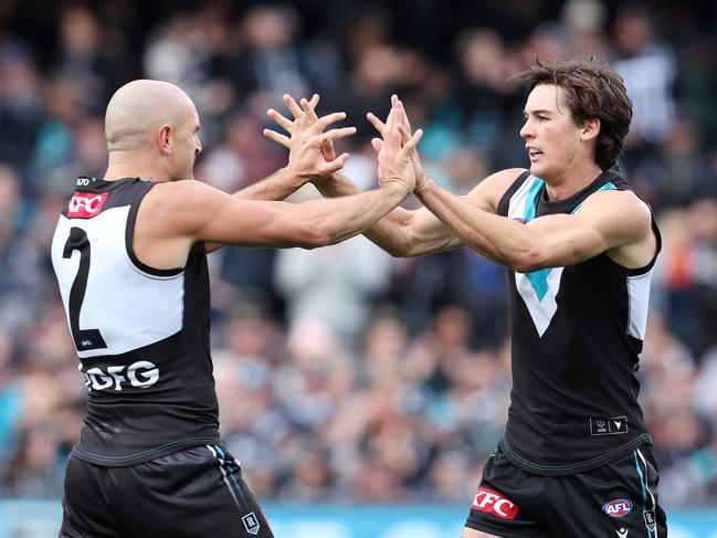 ADELAIDE, AUSTRALIA - MAY 07: Connor Rozee of the Power celebrates a goal with Sam Powell-Pepper during the 2023 AFL Round 08 match between the Port Adelaide Power and the Essendon Bombers at Adelaide Oval on May 7, 2023 in Adelaide, Australia. (Photo by Sarah Reed/AFL Photos via Getty Images)