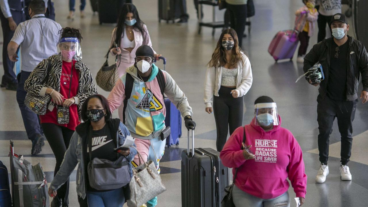 Travel warnings are falling on millions of deaf ears in the United States as domestic flyers took to the skies in large numbers over the weekend. Picture: David McNew/Getty Images/AFP