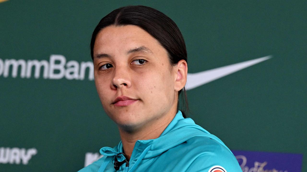 (FILES) Australia's soccer captain Sam Kerr answers questions during a press conference in Melbourne on July 3, 2023 after Australia named their squad for the upcoming FIFA Women's World Cup 2023 football tournament to be held in Australia and New Zealand. Sam Kerr says the only thing missing in her life is a major trophy with Australia -- and the Chelsea forward plans to change that by winning her home World Cup. (Photo by William WEST / AFP) / --IMAGE RESTRICTED TO EDITORIAL USE – STRICTLY NO COMMERCIAL USE-- TO GO WITH Fbl-WC-2023-women-AUS-Kerr, PROFILE by Martin PARRY