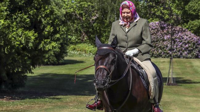 The Queen’s passion for horseriding began in her youth and endured through the coronavirus pandemic, when she was photographed riding a fell pony named Balmoral Fern. Picture: Steve Parsons/The Times