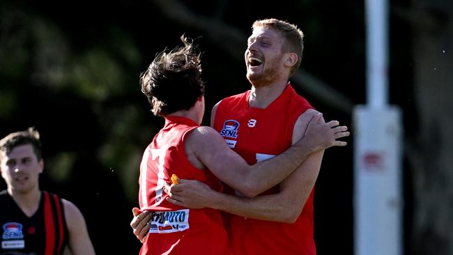 Callum Morgan and Daniel Taberner embrace during Saturday’s win. Picture: Andy Brownbill