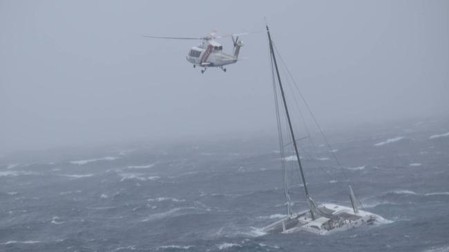 A helicopter struggles to reach a stricken yacht off Whangarei in NZ's north. Picture: NZ Defence Force.