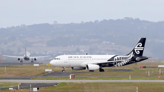 Air New Zealand plane is seen at Auckland Airport on March 16. Picture: Hannah Peters/Getty Images.