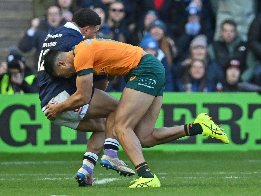 Joseph-Aukuso Suaalii was hurt making this tackle on Scotland's centre Sione Tuipulotu. Picture: AFP