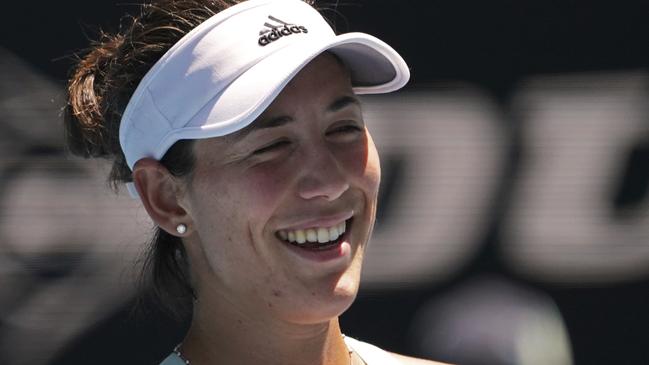 Muguruza was all smiles after her victory. Picture: AP