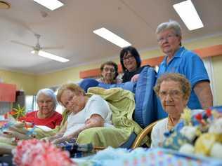 CARING ENVIRONMENT: Resthaven Aged Care residents (front from left) Jean Callighan, Desley Helshan, Freda Younger and (at back) Mavis Parsons, facility manager and co-owner Mary Anne Edwards and diversional therapist Wendy Farley. Picture: Madura McCormack