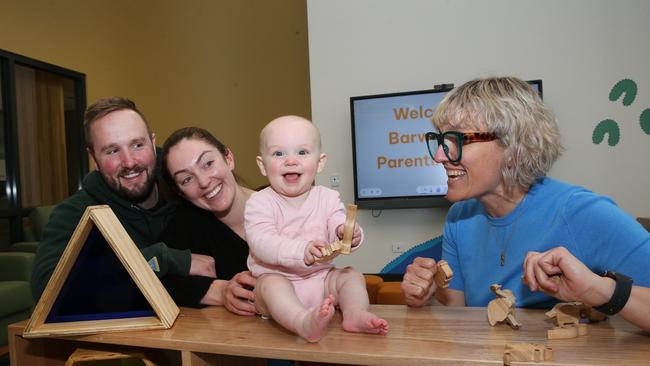 Blair and Courtney Taylor with their baby daughter Delilah and pediatrician Dr Brook Doherty. Picture: Alan Barber