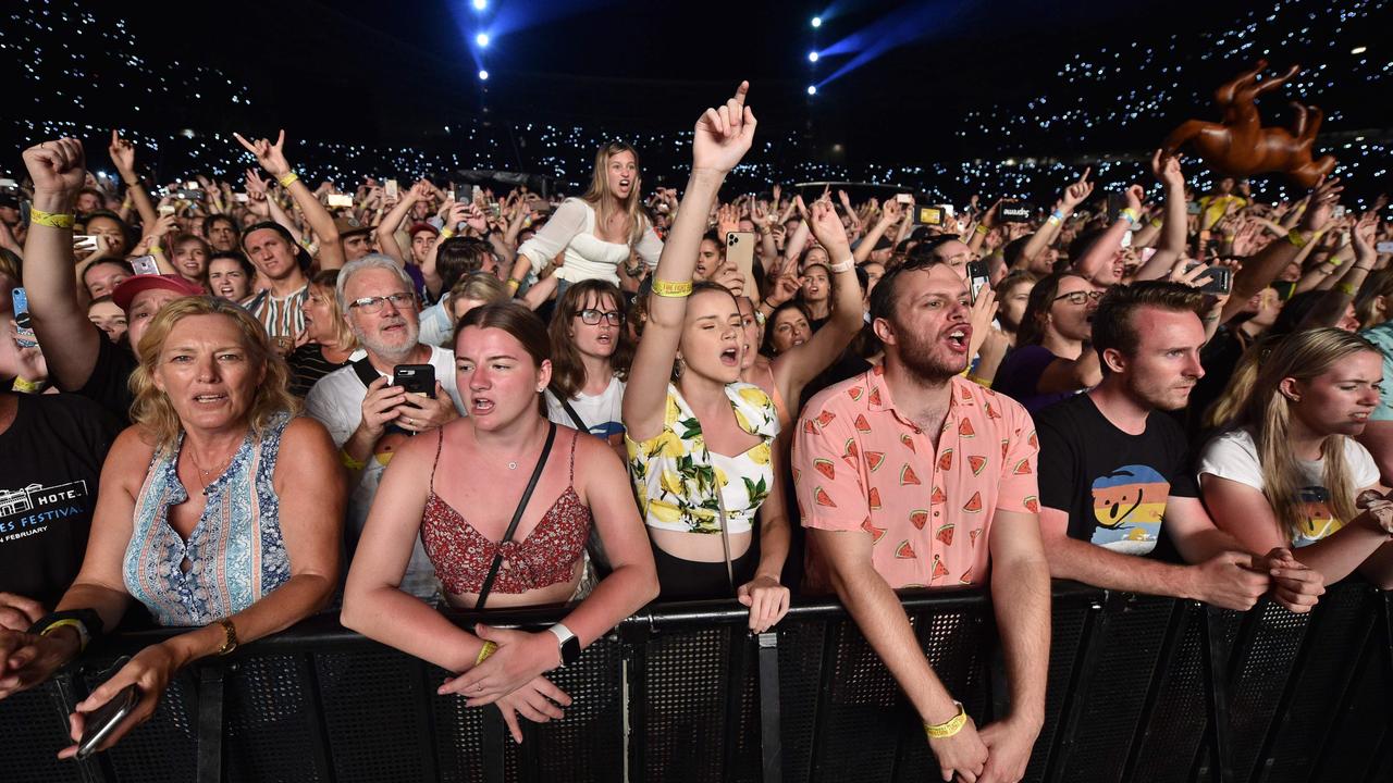 Fans watch Queen and Adam Lambert. Picture: AFP