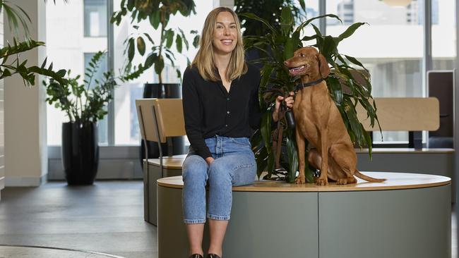 Alexandra Gilbert and her dog Sophie at Amazon’s Melbourne office.