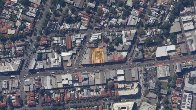 An aerial view of the hotel site in yellow and red at Parramatta Rd.