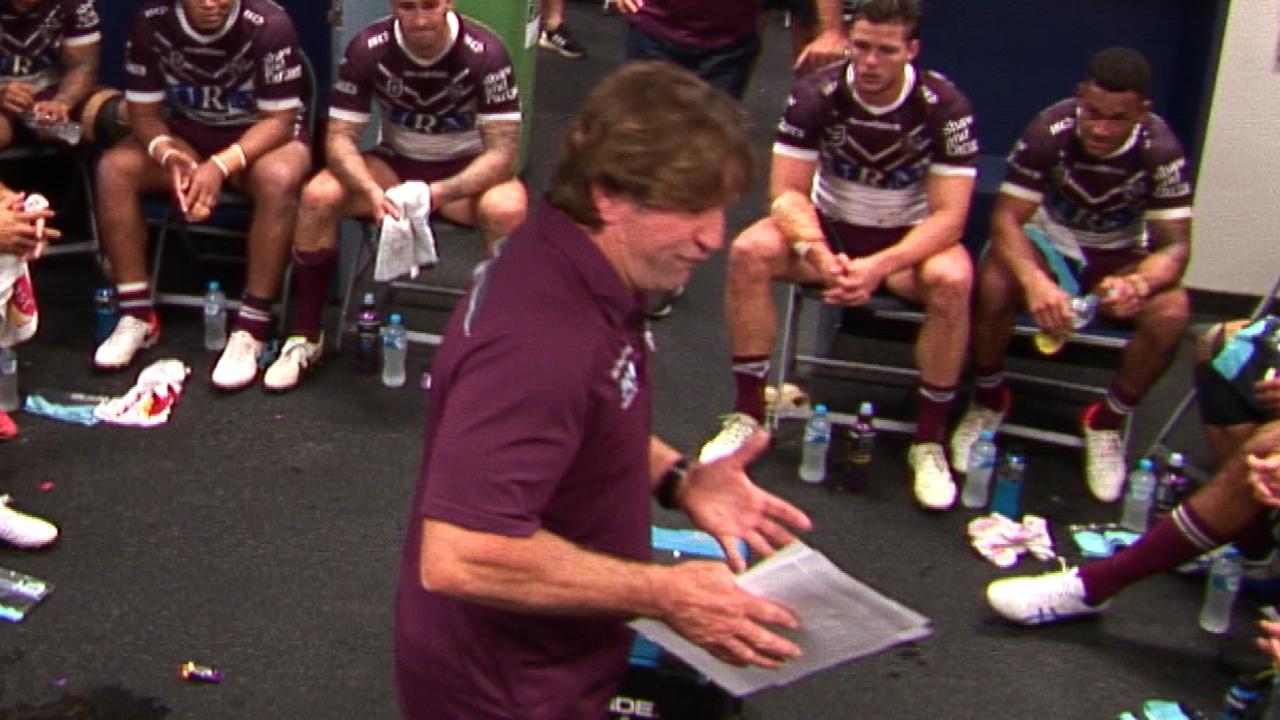 Des Hasler sprays his Manly players.