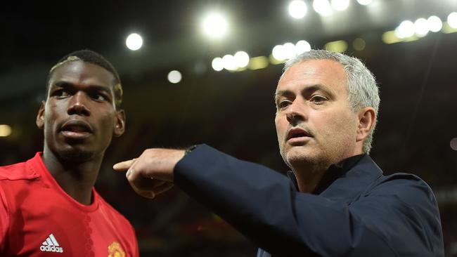 Paul Pogba and Jose Mourinho during a recent Manchester United match.
