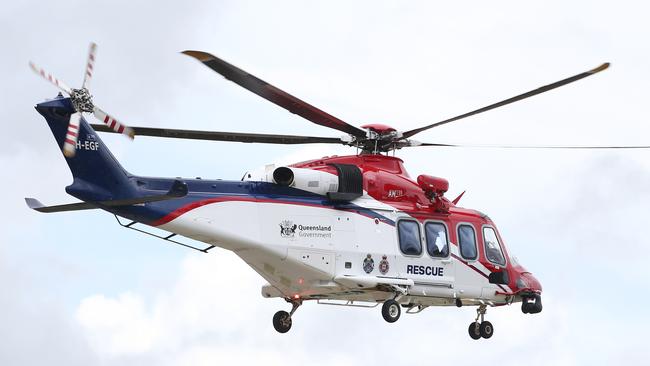 The QG Air rescue helicopter has been tasked to winch out a woman who has fallen from rocks at Little Crystal Creek. PICTURE: BRENDAN RADKE