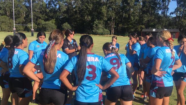 Keebra Park SHS listen to the Year 9-10 halftime address.